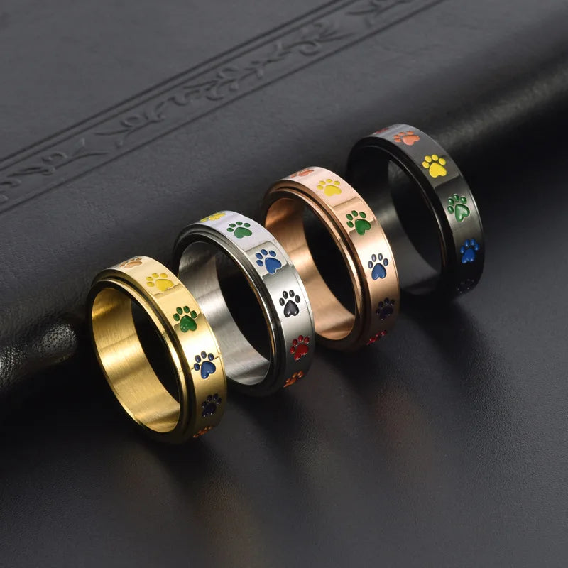 VIP | Spinning Stress Reducing Paw Ring – Stainless Steel with Rainbow Paws