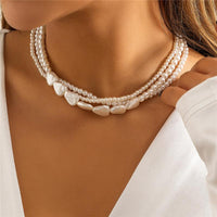 White Stone and Pearl Necklace in Gold