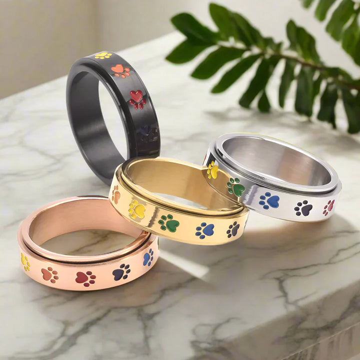 VIP | Spinning Stress Reducing Paw Ring – Stainless Steel with Rainbow Paws
